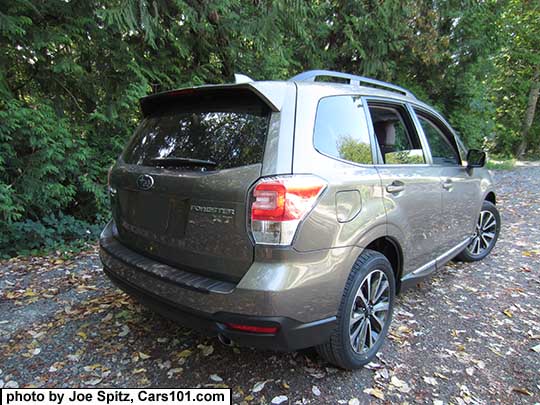 2017 Forester 2.0XT Touring with chrome rocker panel strip. Sepia Bronze Metallic color shown. XT model has redesigned for 2017 18" black and silver 5 split-spoke alloy wheels