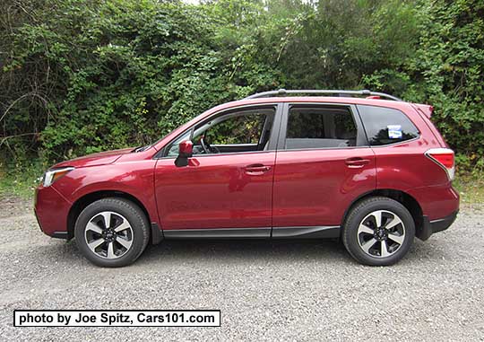 2017 Subaru Forester 2.5 Premium with body colored outside mirrors and dark tinted rear glass, redesigned 17" black/silver alloys and new for 2017 Premium model rear spoiler. Venetian Red color shown.