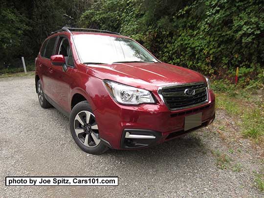 2018 and 2017 Subaru Forester 2.5 Premium with redesigned 17" black/silver alloys and new for 2017 Premium model chrome fog light trim (no fog lights). Venetian Red color shown.