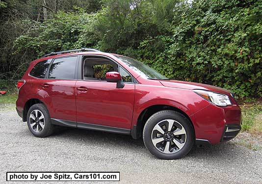 2017 Subaru Forester 2.5 Premium with dark rear glass, body colored outside mirrors, and redesigned 17" black/silver alloys and new for 2017 Premium model chrome fog light trim. Venetian Red color shown.