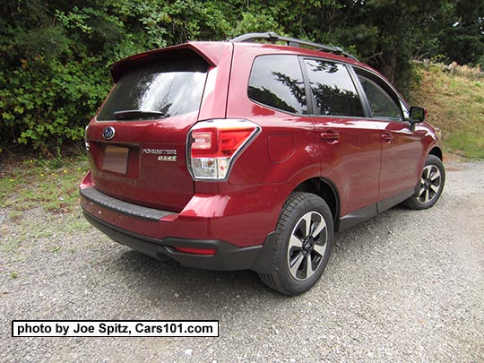 2018 and 2017 Subaru Forester 2.5 Premium with dark rear glass, and redesigned 17" black/silver alloys and new for 2017 Premium model rear spoiler. Venetian Red color shown.