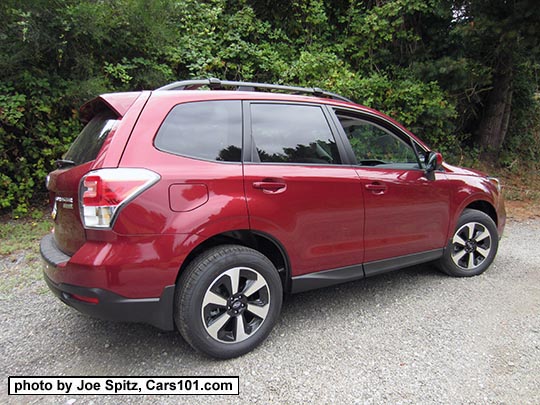 2018 and 2017 Subaru Forester 2.5 Premium with dark rear glass, and redesigned 17" black/silver alloys and new for 2017 Premium model rear spoiler. Venetian Red color shown.