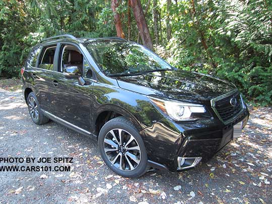 2017 Subaru Forester 2.0XT Touring with chrome rocker strip. Redesigned 2.0XT 18" split spoke black/silver alloys and blacked-out front grill. Crystal black shown.