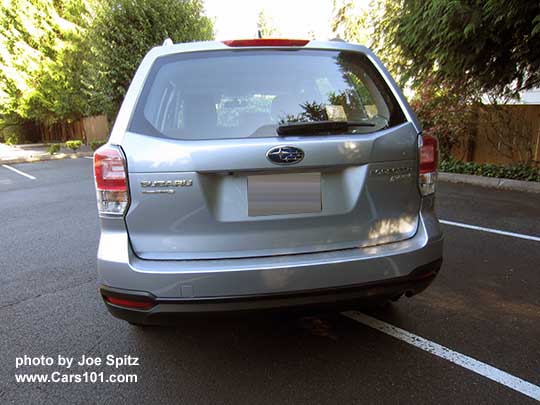 2017 Subaru Forester 2.5 base model has lightly tinted rear windows (not dark tint), and no rear spoiler (all other models have a rear spoiler). Ice silver