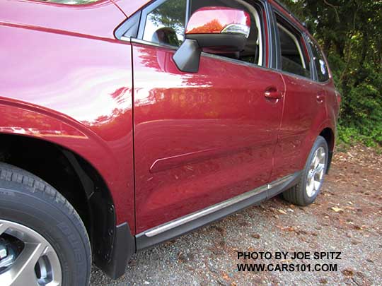 2017 Subaru Forester 2.5i Touring has 18" brushed silver wheels, chrome rocker panel trim. Venetian red color shown.