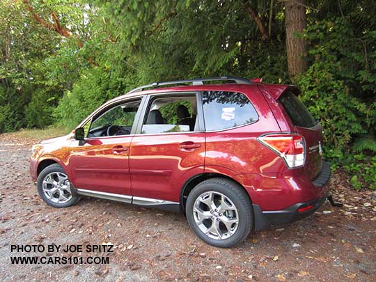 2017 Subaru Forester 2.5i Touring has 18" brushed silver wheels, chrome rocker panel trim. Venetian red color shown with optional body colored side moldings