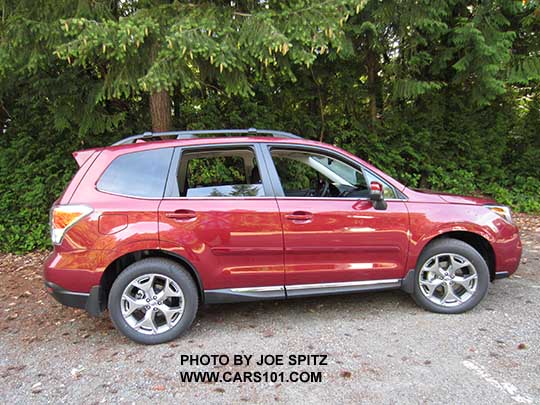 2017 Subaru Forester 2.5i Touring has 18" brushed silver wheels, chrome rocker panel trim. Venetian red color shown.