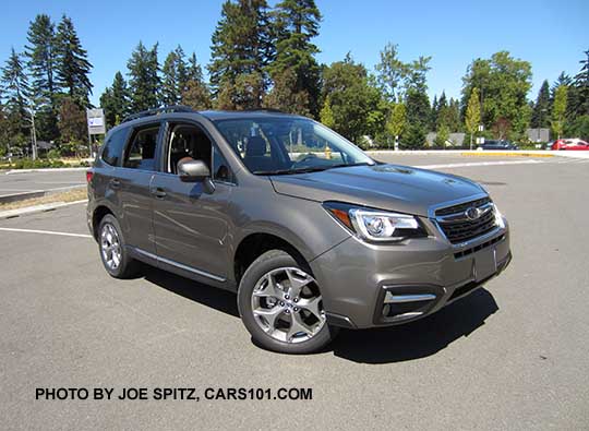 Sepia Bronze 2018 and 2017 Subaru Forester 2.5i Touring with brushed silver 18" wheels