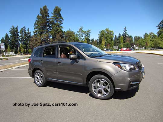 Sepia Bronze 2017 Subaru Forester 2.5i Touring. 18" brushed silver wheels