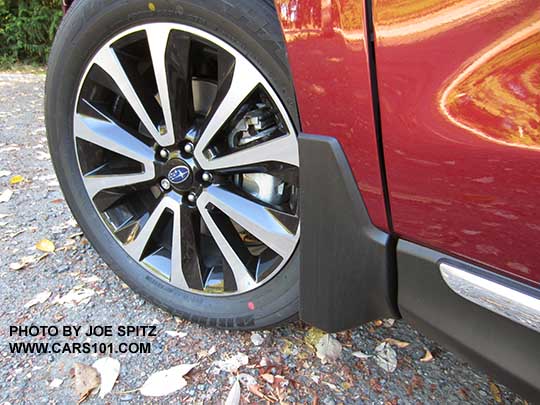 2017 Subaru Forester optional splash guards. left front shown on a red XT model.