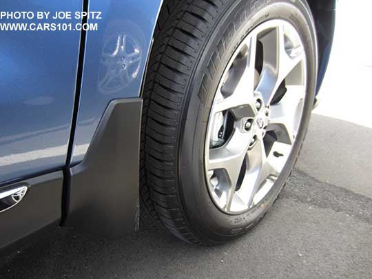 2017 Subaru Forester optional splash guard. Right front shown on a blue 2.5i Touring model