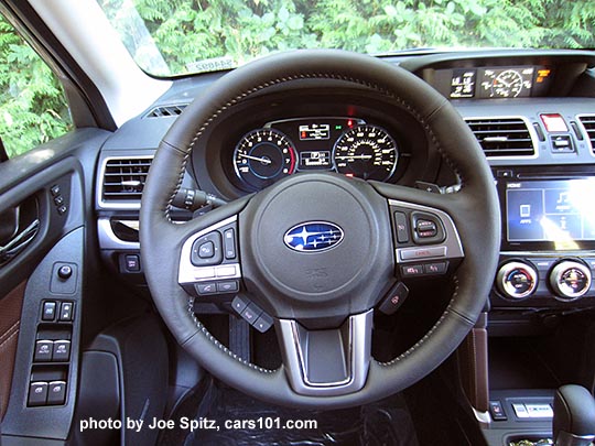2018 and 2017 Subaru Forester Touring steering wheel showing audio and bluetooth cell phone controls, SI Drive,  heated steering wheel on/off.