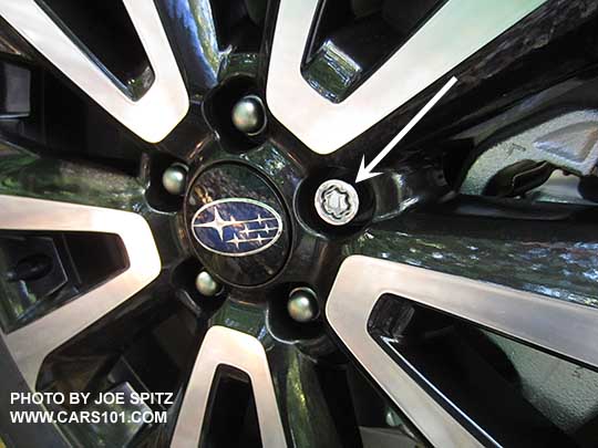 closeup of the optional
                  alloy wheel locks, shown on a 2018 and 2017 Forester
                  XT wheel