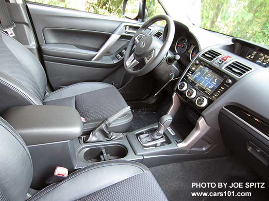 2018 Subaru Forester 2.5 Premium CVT 'Black Edition' black cloth interior with leatherette trim, CVT with gloss black trim, gloss black dash trim,  7" audio.  Also 2.0XT Premium interior.