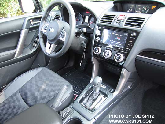 2018 Subaru Forester 2.5 Premium CVT 'Black Edition' black cloth interior with leatherette trim, CVT with gloss black trim, gloss black dash trim,  7" audio.  Also 2.0XT Premium interior.