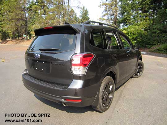 2018 Subaru Forester  2.5 Premium CVT Black Edition has black 18" alloys, black rear logos and badging and stainless exhaust tip... Dark Gray color shown with optional splash guards
