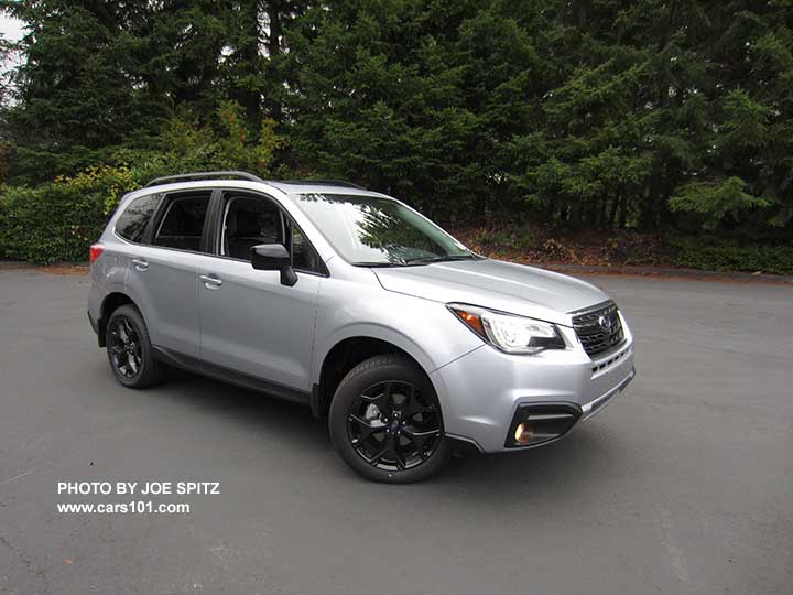 2018 Forester 2.5 Premium CVT Black Edition with black outside mirrors, black 18" alloys, black sport grill with chrome frame, fog lights. Ice silver car shown with optional splash guards