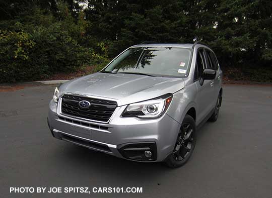 2018 Forester 2.5 Premium CVT Black Edition has black 18" alloys, black outside mirrors, black sport grill with gloss black accent bar and chrome frame, fog lights.   Ice silver car shown.