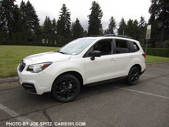 2018 Forester 2.5 Premium CVT Black Edition has black 18" alloys, black outside mirrors, black sport grill with chrome frame, fog lights.   White car shown.