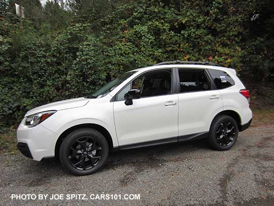 2018 Forester 2.5 Premium CVT Black Edition has black 18" alloys, black outside mirrors.   White car shown.