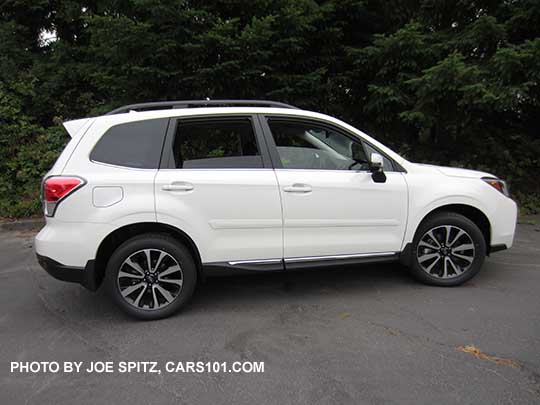 2018 Subaru Forester XT Touring. White shown. Optional side moldings