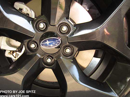 closeup of the 2018 Subaru Forester 2.5i Premium CVT Black Edition 18" black alloy wheel