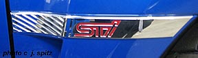 STI logo by the right front wheel