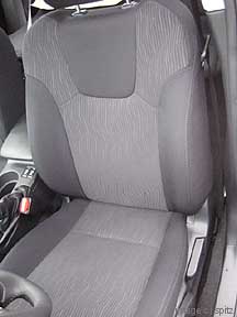 2.5GT has a 2 piece bucket seat with adjustable headrest