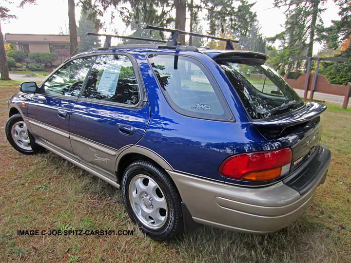 rear view 2000 2.5L outback sport with 2 rear spoilers, blue shown