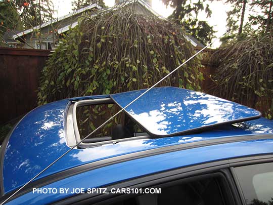 popup and slide power moonroof on the 1998 Subaru Impreza 2.5RS 2 door