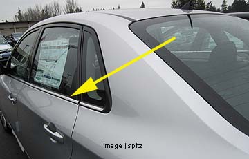 Impreza 4 door sedan window molding is chromed trim