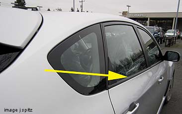 Impreza 5 door window molding is black, no chromed trim