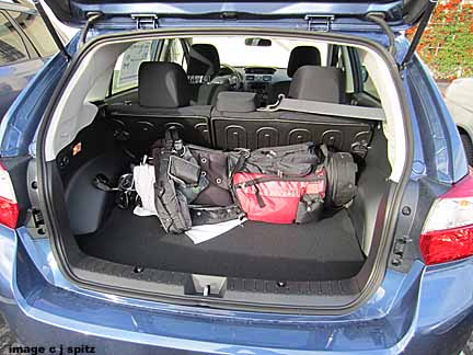 golf clubs in the back of the impreza 5 door hatchback