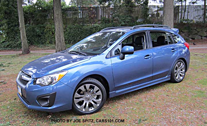 2014 subaru impreza 5 door hatchback. quartz blue color shown