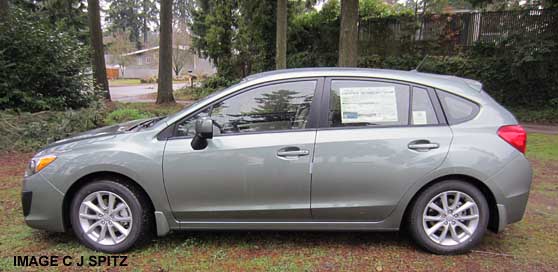 side view, jasmine green subaru impreza hatchback