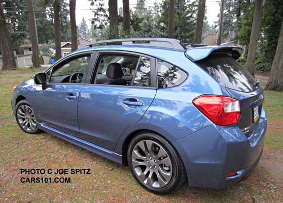 quartz blue subaru impreza sport with optional rear spoiler