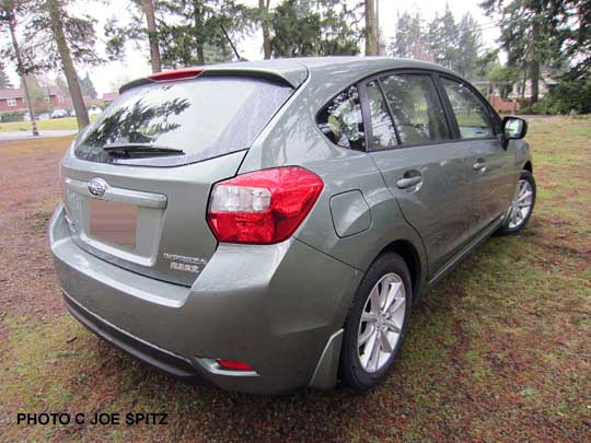 rear view jasmine green 2014 impreza 5 door hatchback