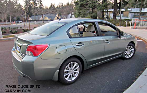 2014 impreza 4 door, jasmine green color shown