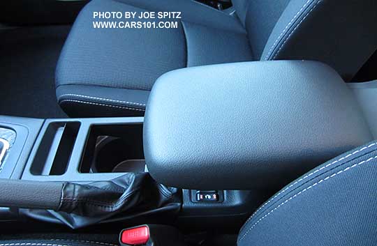2015 Impreza Premium, Limited, Sport console with 2 cupholders and heated seat buttons and sliding armrest pushed forward