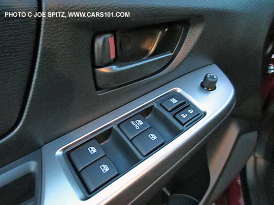2015 Subaru Impreza 2.0i driver's door black inner door handle and  black power window switches