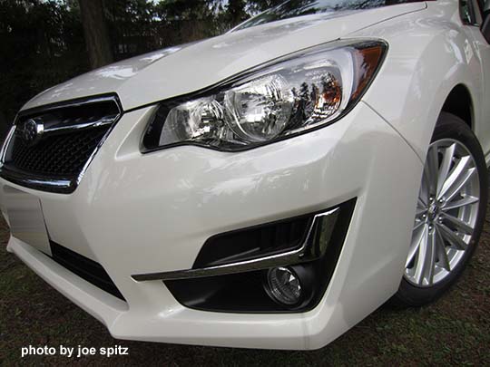 2015 Impreza left fog light, headlights, chrome trim. crystal white shown