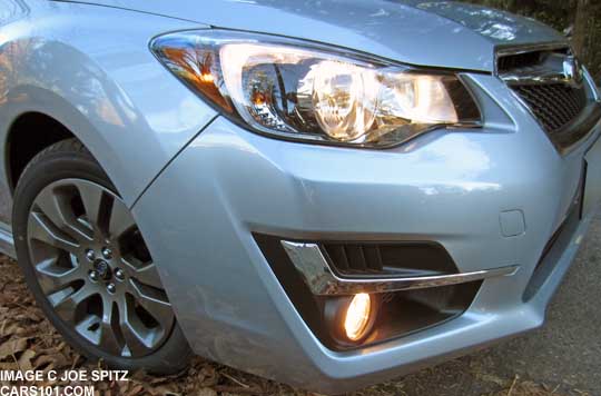 2015 Impreza fog light, ice silver Sport model shown, with new chrome trim