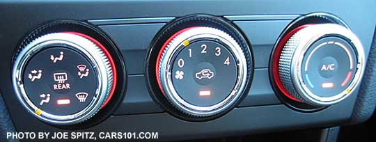 Impreza 2.0i, Premium and Sport Premium  manual heater/ac controls with 4 speed fan. Red lit at night.