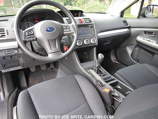 2015 Impreza 2.0i interior, off black cloth, manual transmission shown