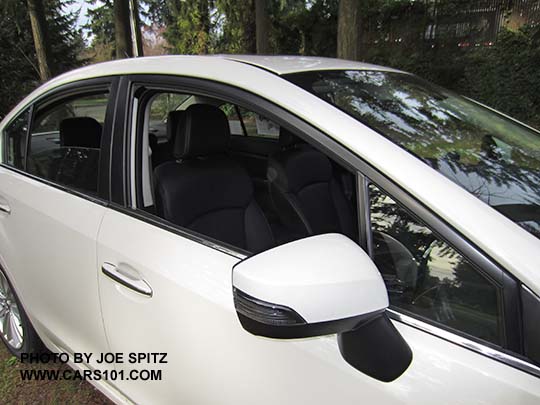 2015 Impreza Limited outside mirror with integrated turn signals. Crystal white 4 door sedan shown