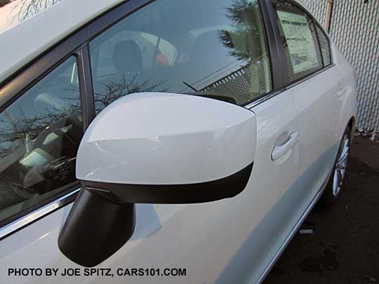 2015 Impreza Premium body colored outside mirror, white 4 door sedan shown