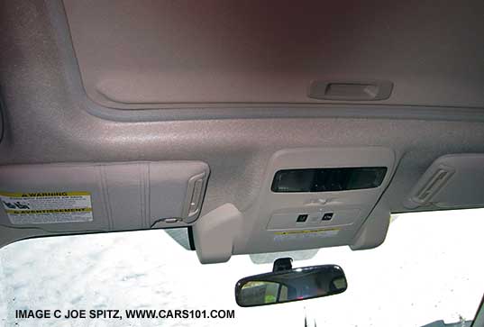 Impreza with optional Eyesight safety system cameras, and moonroof with sunshade closed