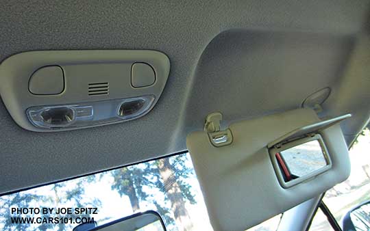 2015 Impreza 2.0i base model overhead console with dual map lights and bluetooth microphone. Also showing the sun visor with vanity mirror (not lit)