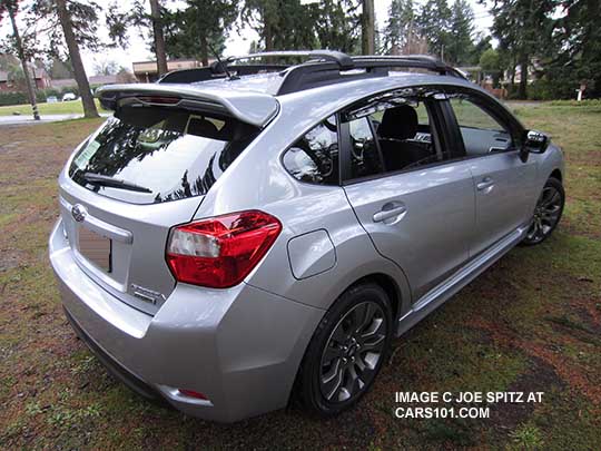 optional rear spoiler on a 2015 Subaru Impreza 5 door, ice silver Sport model shown