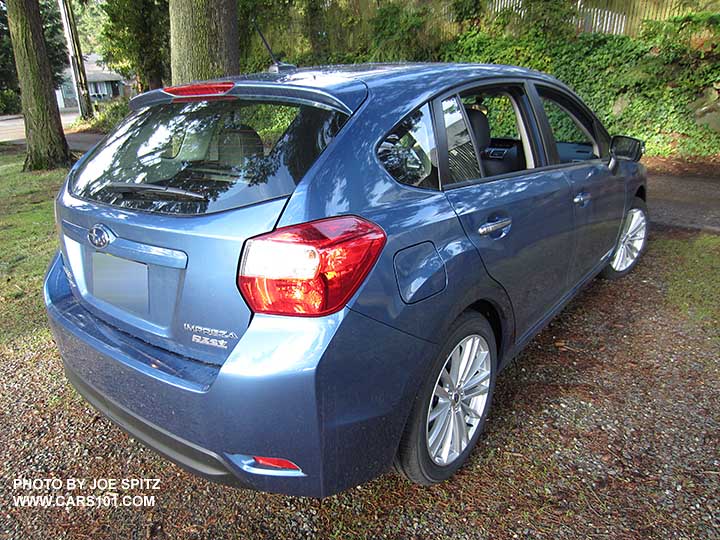 rear view 2015 impreza 5 door hatchback. Note no roof rails. Limited model, quartz blue shown